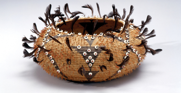 <strong> What ceremonial role did the Pomo tribal baskets, covered with feathers and shells, have?</strong> A)Jewelry B)No ceremonial function, only practical use C)Gifts D)Religious offerings