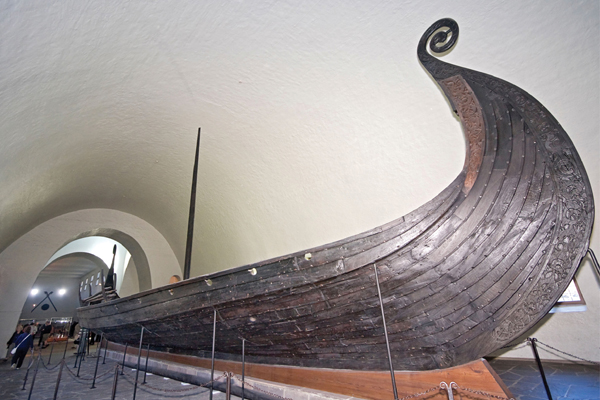 <strong> Which of the following statements is true about the Viking Ship ?</strong> A)It probably was used by the Viking elite to sail nearby, and then was repurposed for burial. B)It was a rare example of a tomb that has been untouched since the time of burial. C)It was the ship used by the hero Beowulf. D)It functioned as a reliquary, holding relics of the most venerated Viking saints.