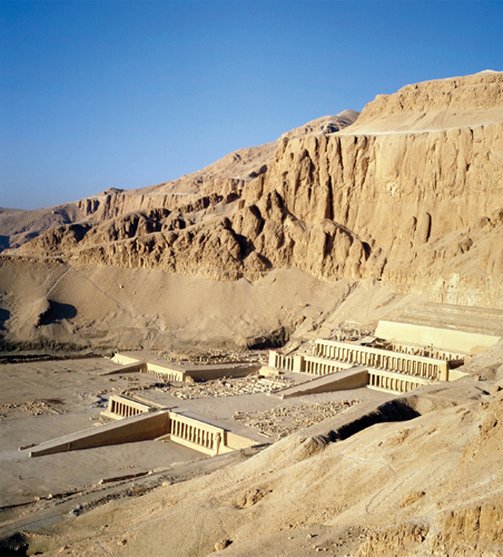 <strong> How does the Mortuary Temple of Hatshepsut reflect public opinion?</strong> A)It depicts only female deities to emphasize Hatshepsut's unusual status as female pharaoh. B)It omits military imagery because that was not considered appropriate for women in Egyptian society. C)It was built to honor her, but later was defaced by her successors. D)As one of the great pharaohs of ancient Egypt, her temple continued to be honored long after her death.