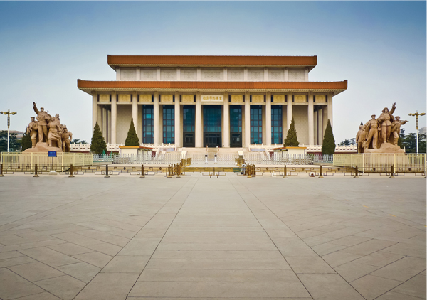 <strong> How is the placement of the Mausoleum of Mao Zedong significant?</strong> A)The mausoleum is placed above the imperial tombs to mark Communism's victory over its predecessors. B)The mausoleum is situated in Beijing's traditional core to assert the authority of the Communist government after centuries of imperial rule. C)It is placed on the holy mountain outside of Beijing as a mark of the prestige of the Communist leader. D)Its placement aligns with sunrise on summer solstice to mark the dawning of a new era for China.