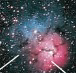 Of the two colors shown in the image above, the pink colored nebula is the least common.