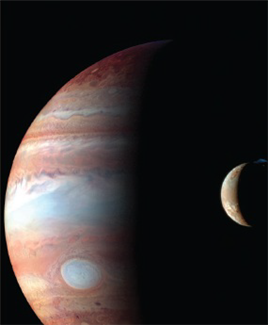 <strong> On the night side and in the northern hemisphere of this Galilean moon is an eruption of small particles that scatter the light, as shown in this image that combines visual and infrared data. Based upon this information, which Galilean moon is in the image?</strong> A) Io B) Europa C) Ganymede D) Callisto