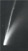<strong> Which tail in the above photo is the gas tail?</strong> A) the straight lined white tail B) the curved white tail C) both the straight and curved tails D) Neither because the photo does not show a gas tail.