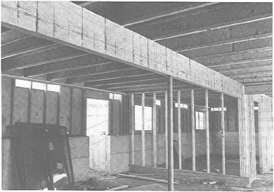 <strong> In the accompanying figure, the ____ supports the floor framing.</strong> A) pocket B) girder C) anchor bolt D) mold